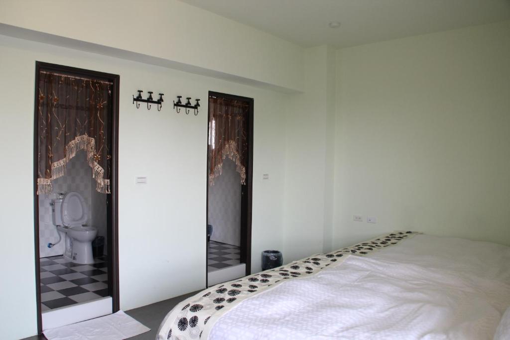 Postel nebo postele na pokoji v ubytování Magi House