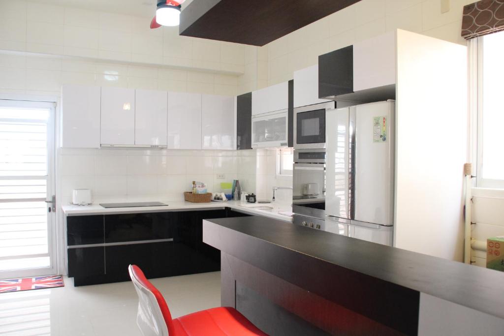 Kuchyň nebo kuchyňský kout v ubytování Magi House