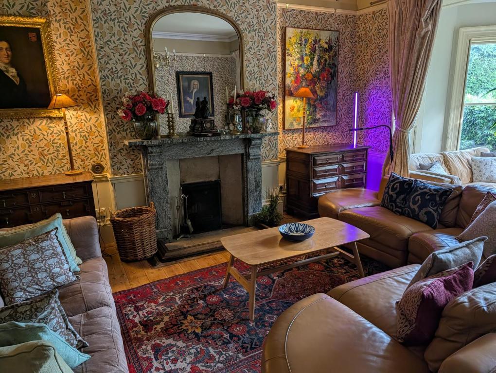 Istumisnurk majutusasutuses The Writer's Retreat Ground Floor Apartment