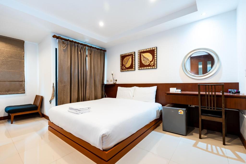 Ένα ή περισσότερα κρεβάτια σε δωμάτιο στο YON INN Sukhumvit 4 Bangkok - BTS Nana