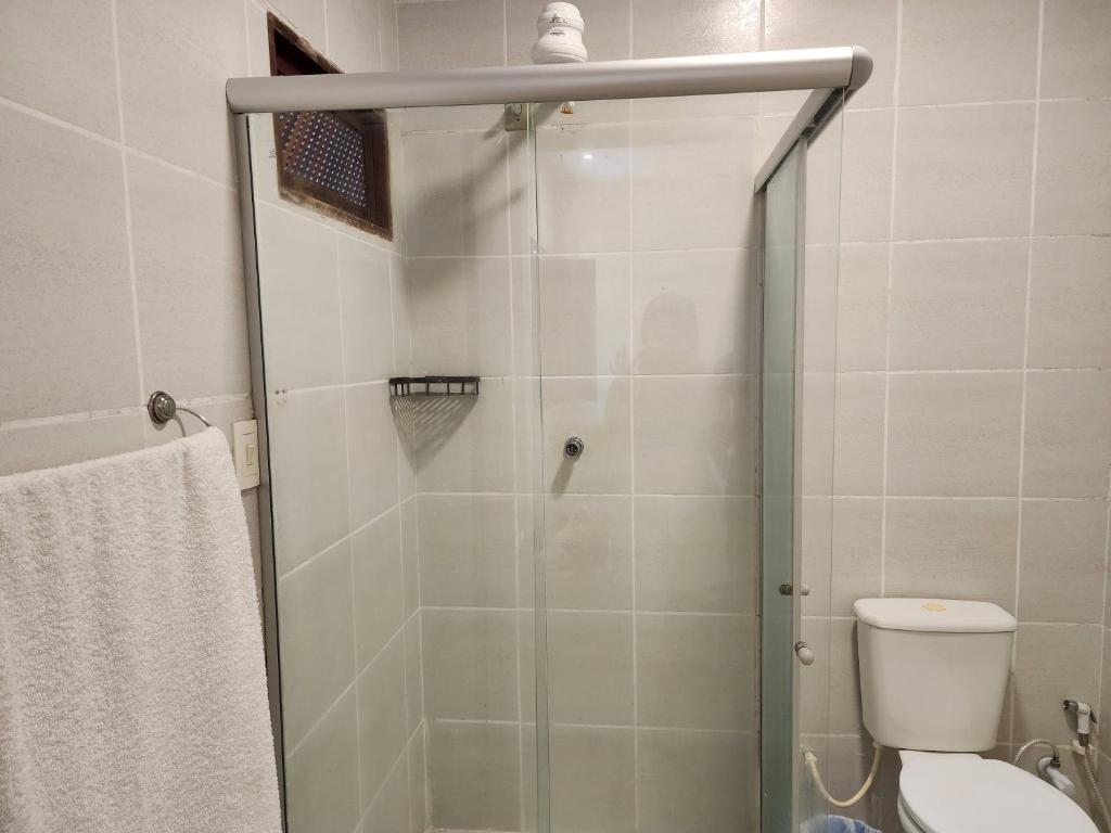 a bathroom with a shower with a toilet at Pipa Villa Mar in Pipa