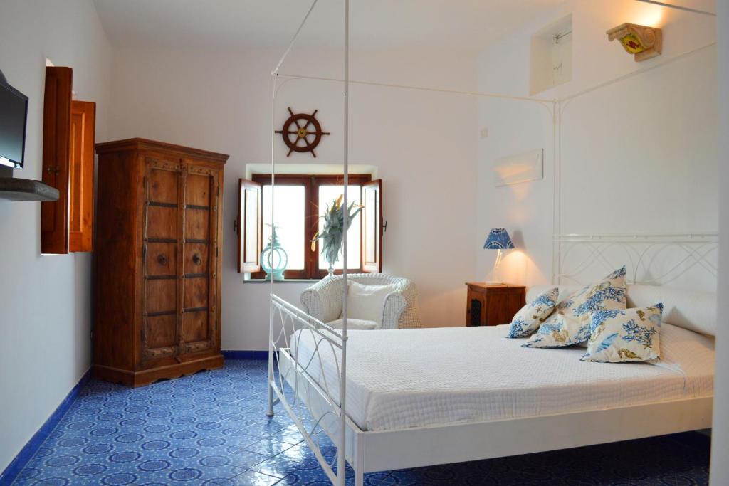 Postel nebo postele na pokoji v ubytování Casa Corallo