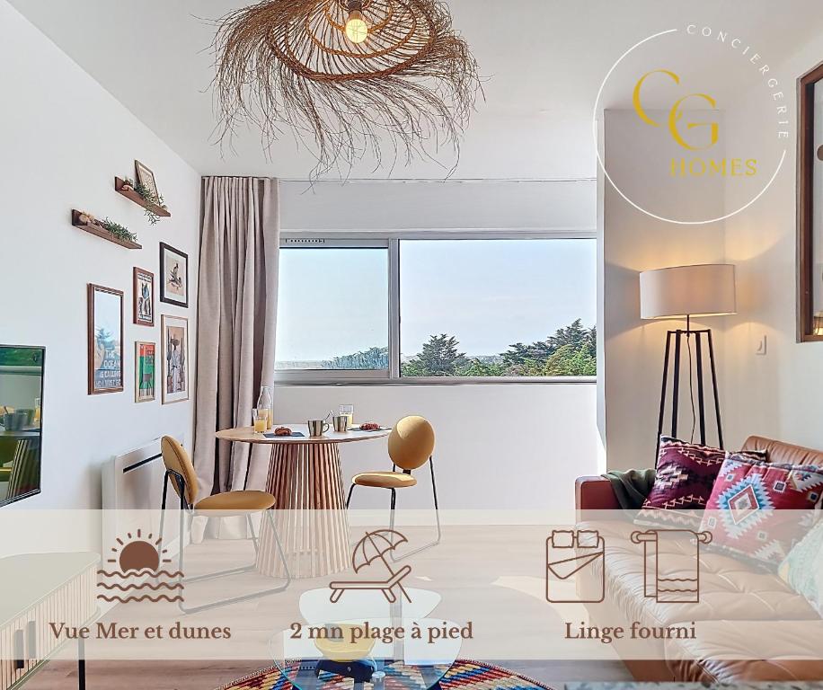 a living room with a table and chairs at L'Horizon doré, Vue mer et dunes, Plage à pied in Saint-Hilaire-de-Riez