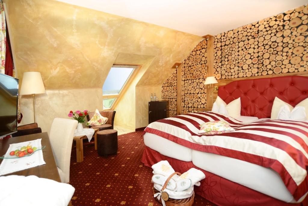Postel nebo postele na pokoji v ubytování Hotel Krone Igelsberg