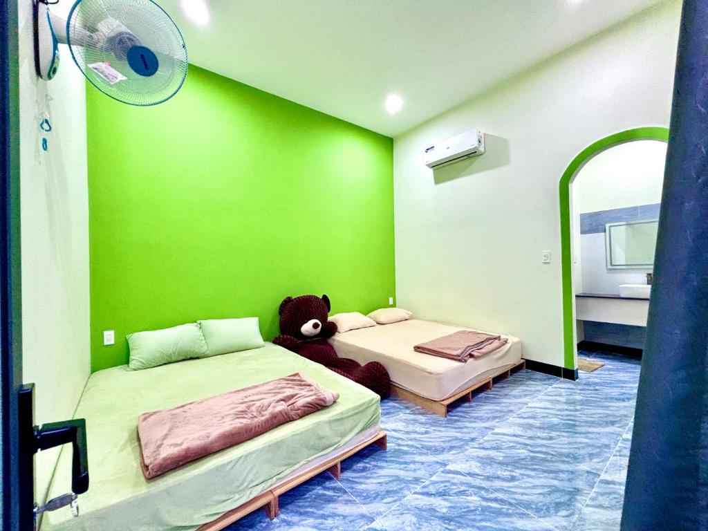 Postel nebo postele na pokoji v ubytování Thao's House