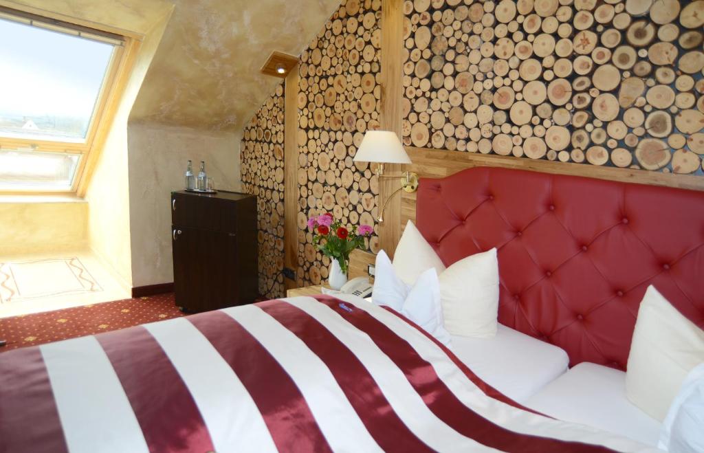 Postel nebo postele na pokoji v ubytování Hotel Krone Igelsberg