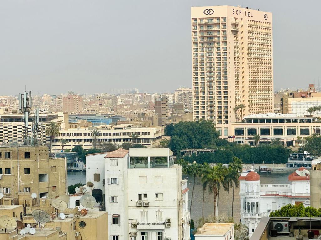 a view of a city with tall buildings at Golden Era stylish studio i903 TenTon Zamalek in Cairo
