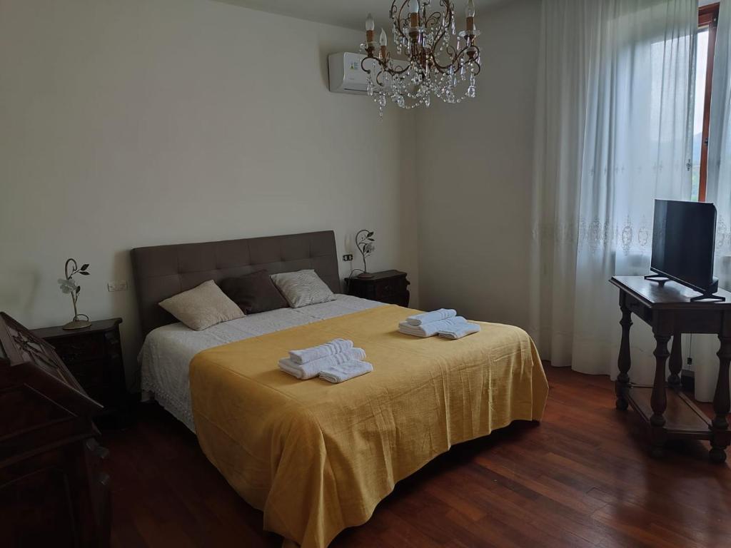 Giường trong phòng chung tại Villa Iliana