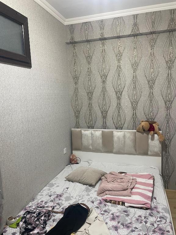 Ένα ή περισσότερα κρεβάτια σε δωμάτιο στο Cemila Home