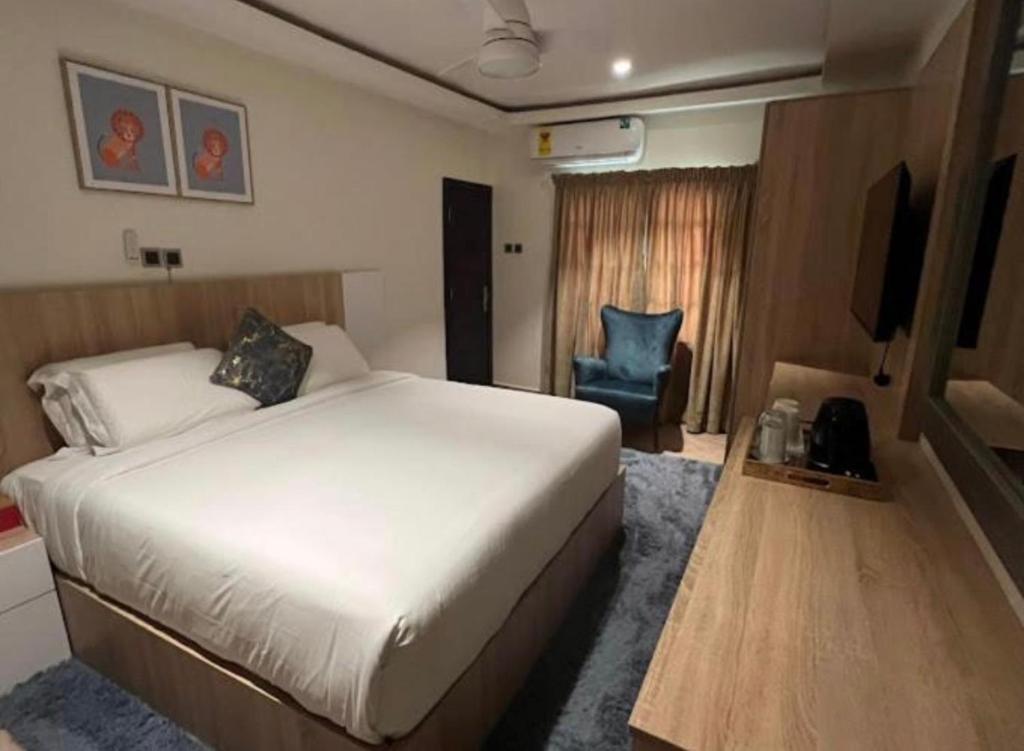 Ένα ή περισσότερα κρεβάτια σε δωμάτιο στο Essien Apartments
