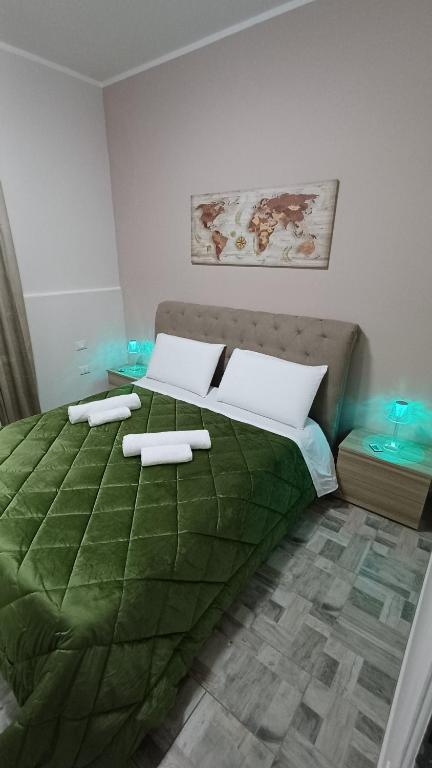 Ένα ή περισσότερα κρεβάτια σε δωμάτιο στο Angela apartments 01