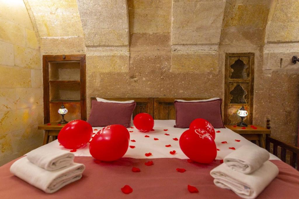 Postel nebo postele na pokoji v ubytování Ürgüp Masal pansiyon