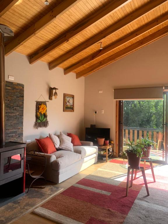 Posezení v ubytování Chalet con Tinaja LicanRay