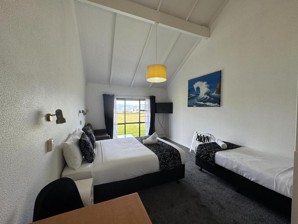 Postel nebo postele na pokoji v ubytování Chelmswood Motel Taupo