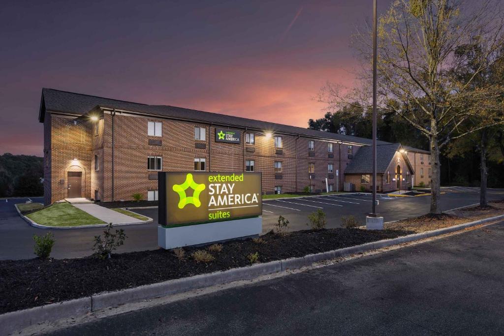 a sign in front of a building with a sign in front at Extended Stay America Suites - Columbia - Greystone in Columbia