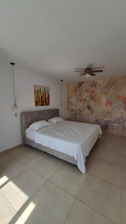 Ένα ή περισσότερα κρεβάτια σε δωμάτιο στο Loft