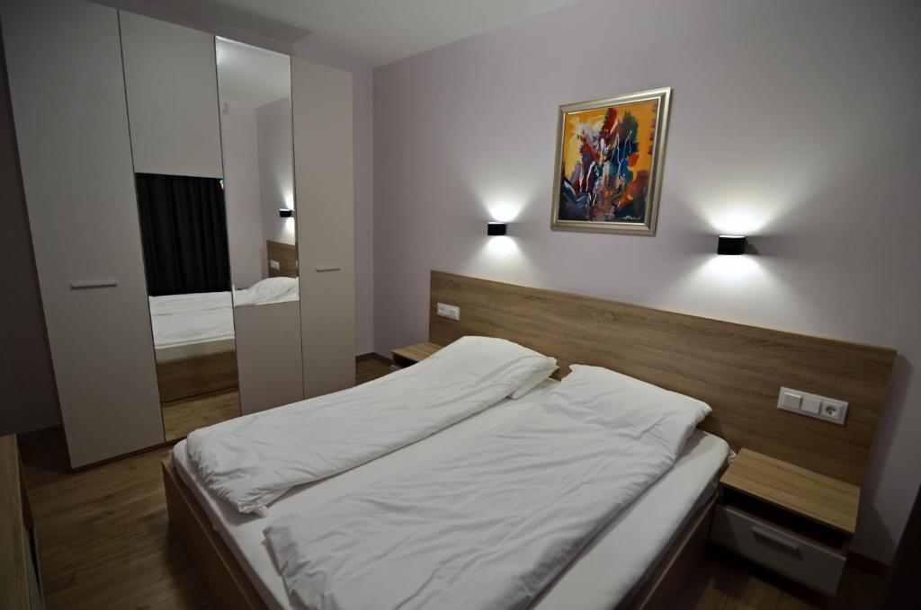 Postel nebo postele na pokoji v ubytování Guest House Colori
