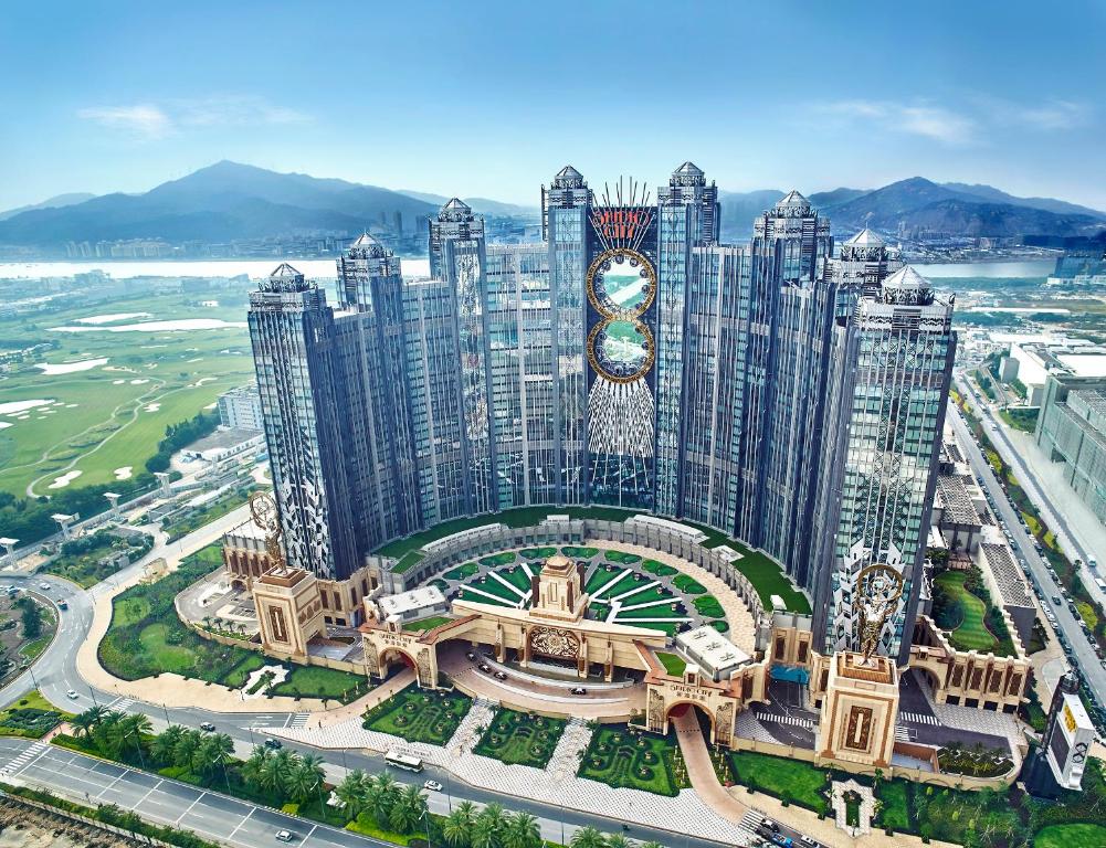 an aerial view of a large city with tall buildings at Studio City Hotel in Macau