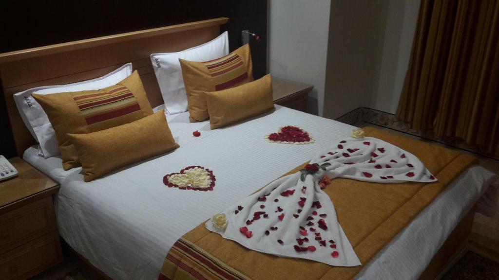 Postel nebo postele na pokoji v ubytování Hotel Julius