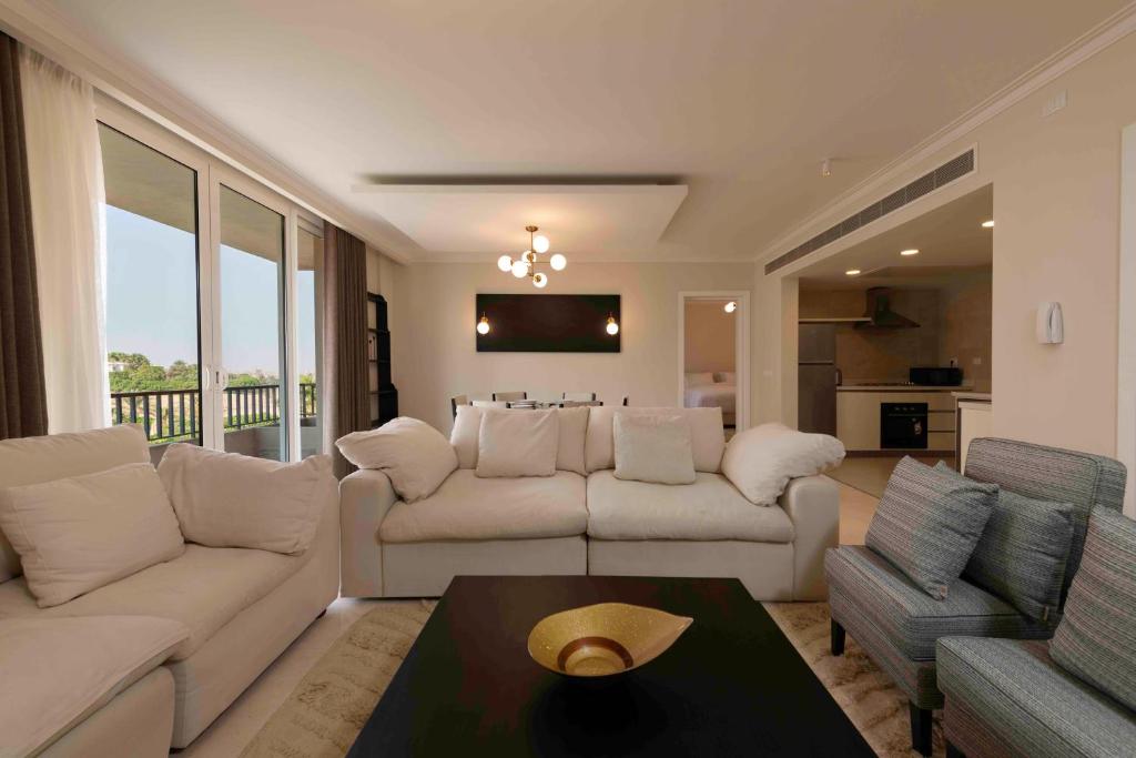 Posezení v ubytování 1BDRM at Pyramids Hills