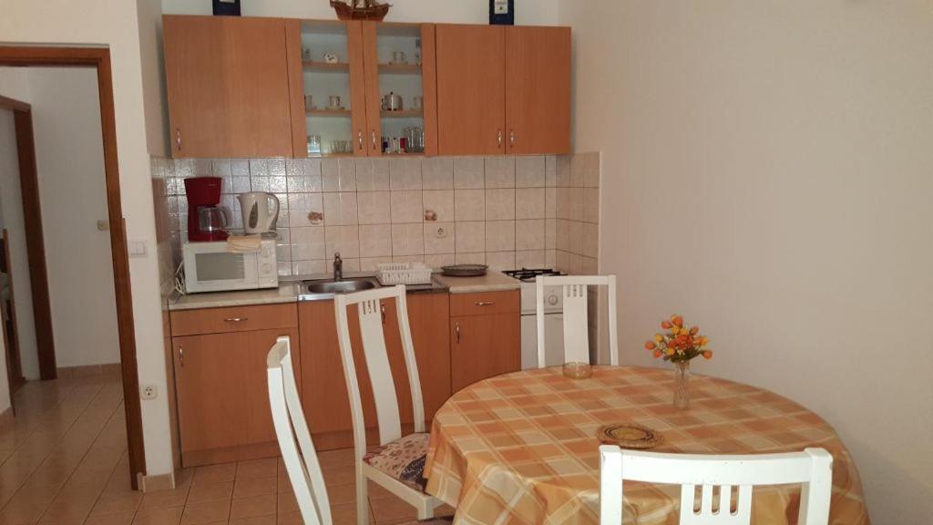 Kuchyň nebo kuchyňský kout v ubytování Apartments Drago Kovačić