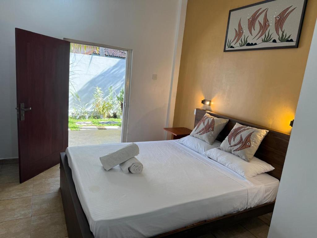 Кровать или кровати в номере Lu3ky's Den