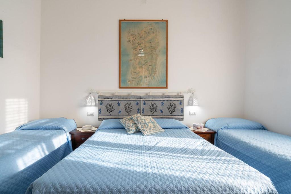 Postel nebo postele na pokoji v ubytování Cagliari Central Rooms With Port View