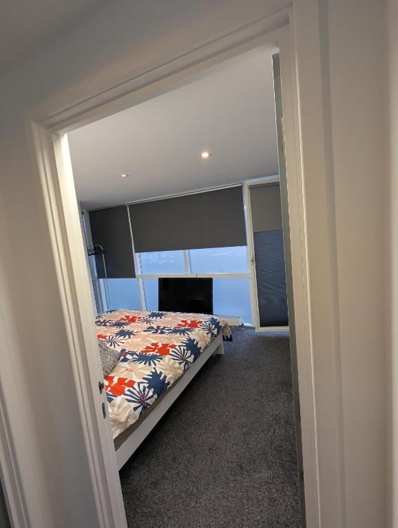a bedroom with a bed in a room at Brick Lane Flats in London