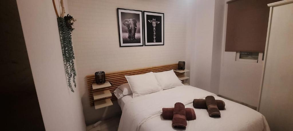 Postel nebo postele na pokoji v ubytování Amanecer Andaluz