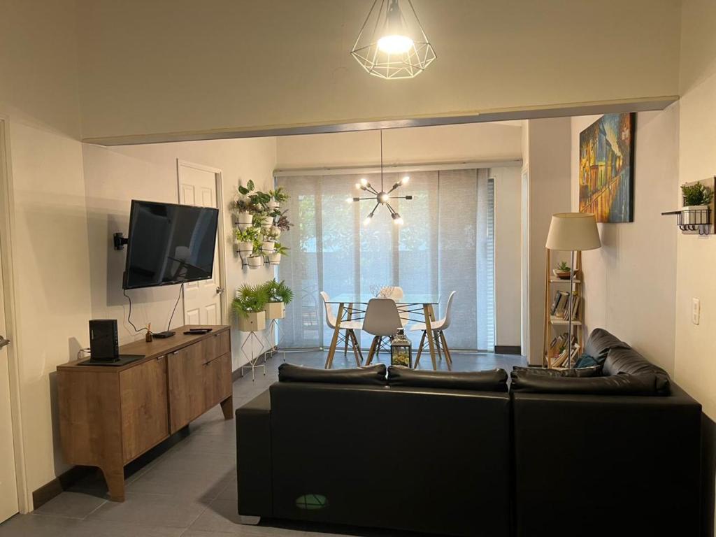 TV a/nebo společenská místnost v ubytování Casa Florez