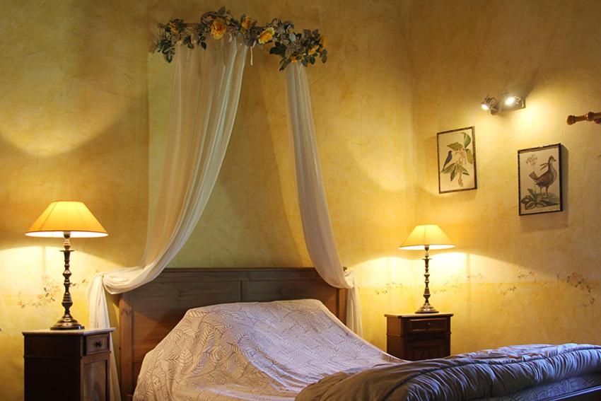 Postel nebo postele na pokoji v ubytování Maison d'hôtes Ferme de la Commanderie