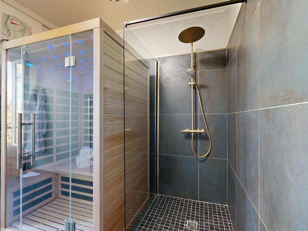 Ένα μπάνιο στο Appartement Standing Sauna Privé