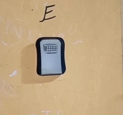a close up of a cell phone with an ex on it at Cozy Kipepeo Cottage in Nairobi