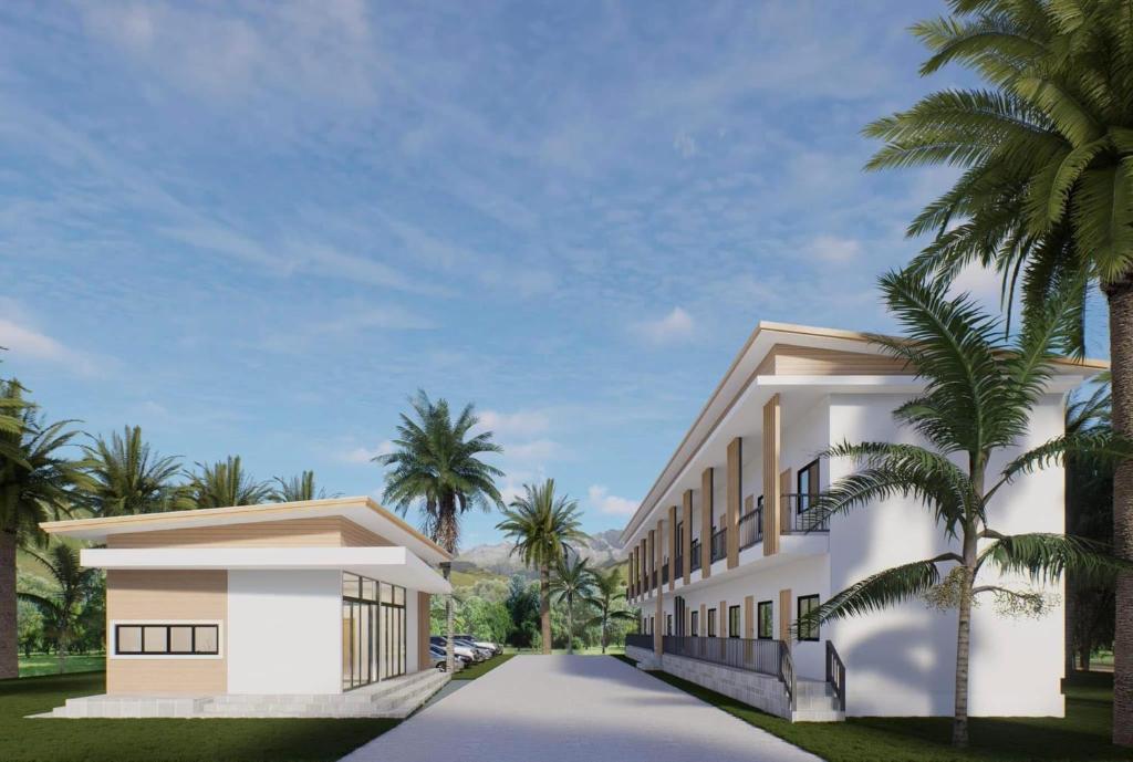 un revestimiento del exterior de un edificio en ต้นจันทร์เรสซิเดนซ์, en Chaweng