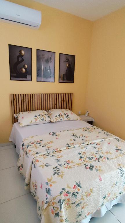 En eller flere senge i et værelse på Residência Lima 1