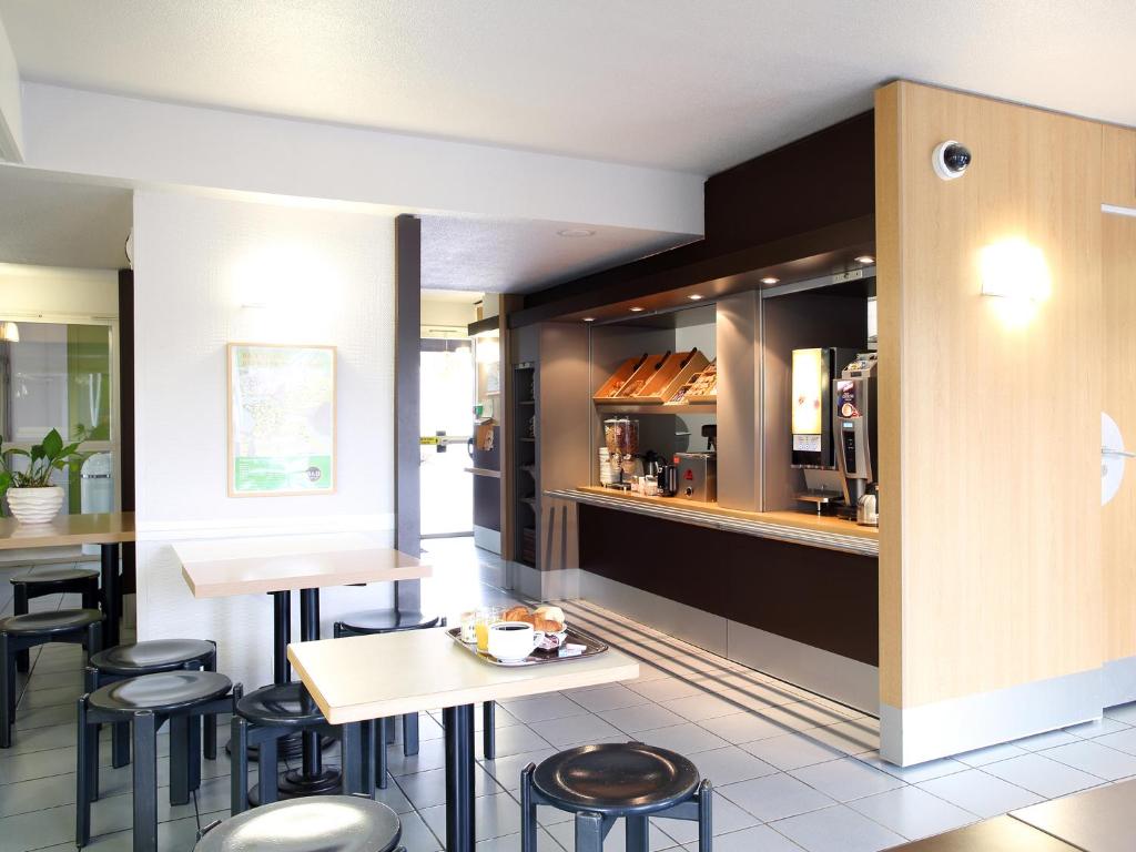 Kuchyň nebo kuchyňský kout v ubytování B&B HOTEL Montpellier 2
