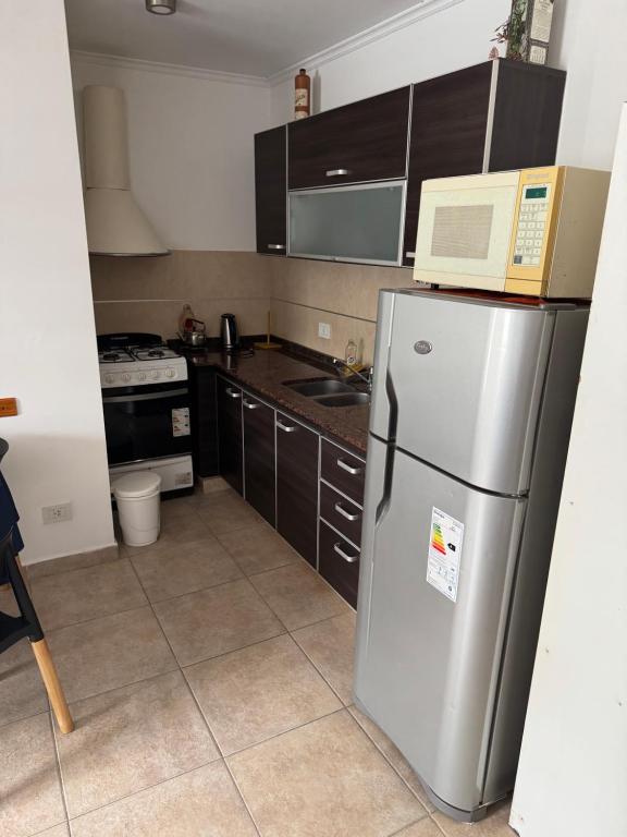 Η κουζίνα ή μικρή κουζίνα στο Departamento Costa Azul