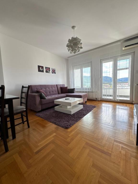 Ένα ή περισσότερα κρεβάτια σε δωμάτιο στο Apartman 50