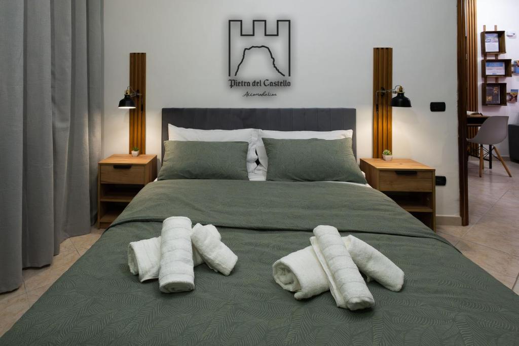 Ένα ή περισσότερα κρεβάτια σε δωμάτιο στο Pietra del Castello