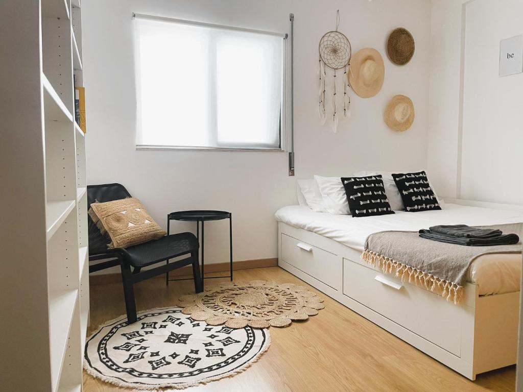 Ένα ή περισσότερα κρεβάτια σε δωμάτιο στο Casa C`alma - Olhão