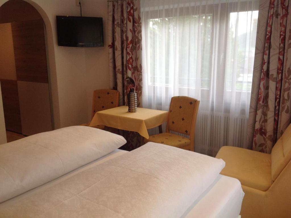 Postel nebo postele na pokoji v ubytování Apart Garni Lais