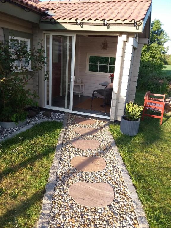a walkway in front of a house at Furusol Borgholm in Borgholm