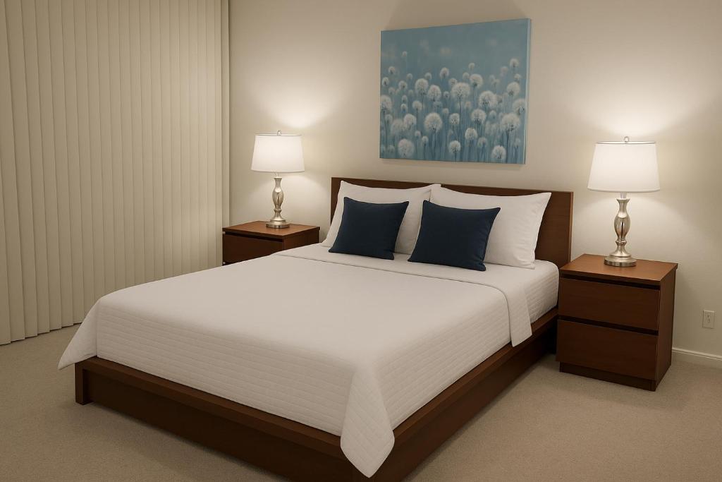 Una cama o camas en una habitación de 46th floor Beetham Tower