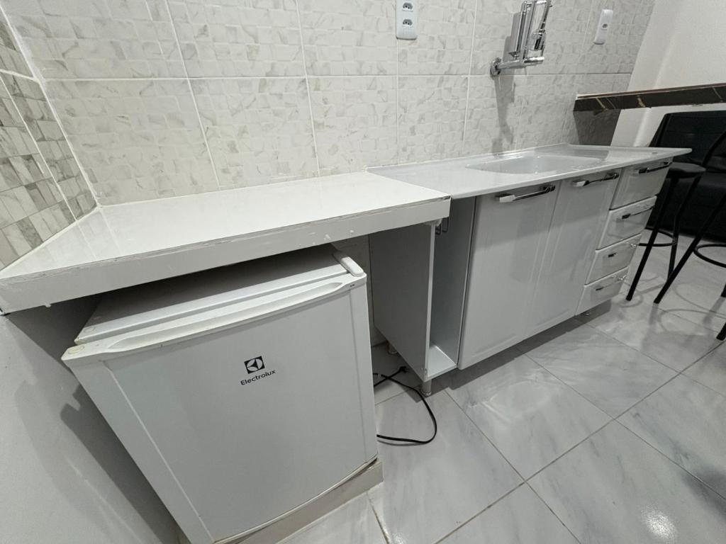 Køkken eller tekøkken på Lindo apartamento mobiliado - Belém Centro