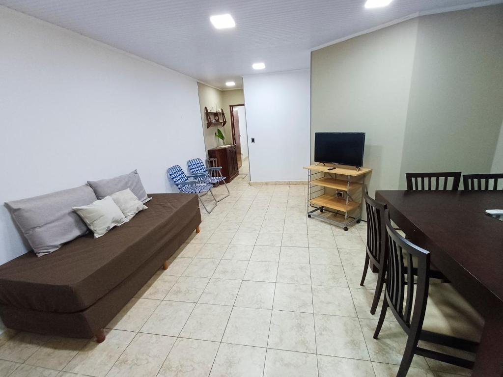 a living room with a couch and a table at Departamento Oberá-1 in Oberá
