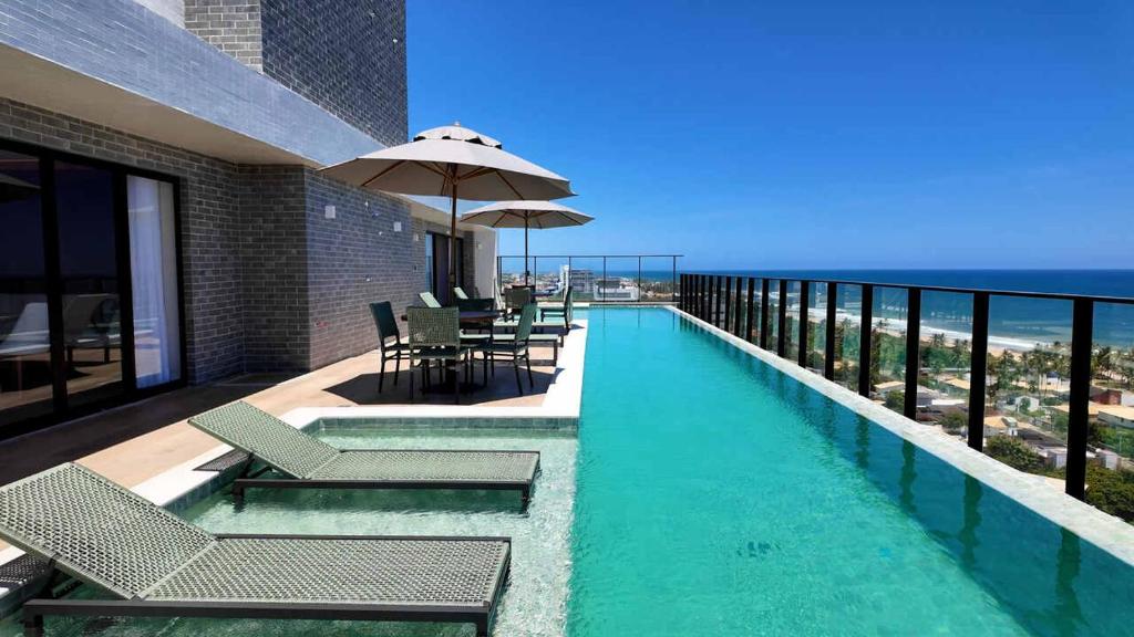 Πισίνα στο ή κοντά στο Recanto de Itapuã