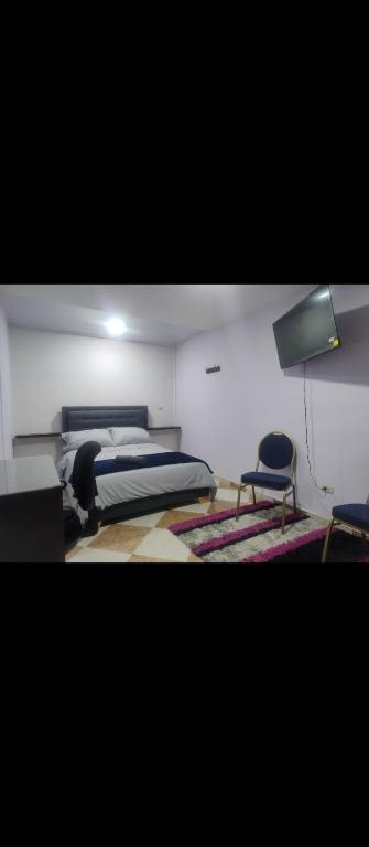 Ένα ή περισσότερα κρεβάτια σε δωμάτιο στο El Portal