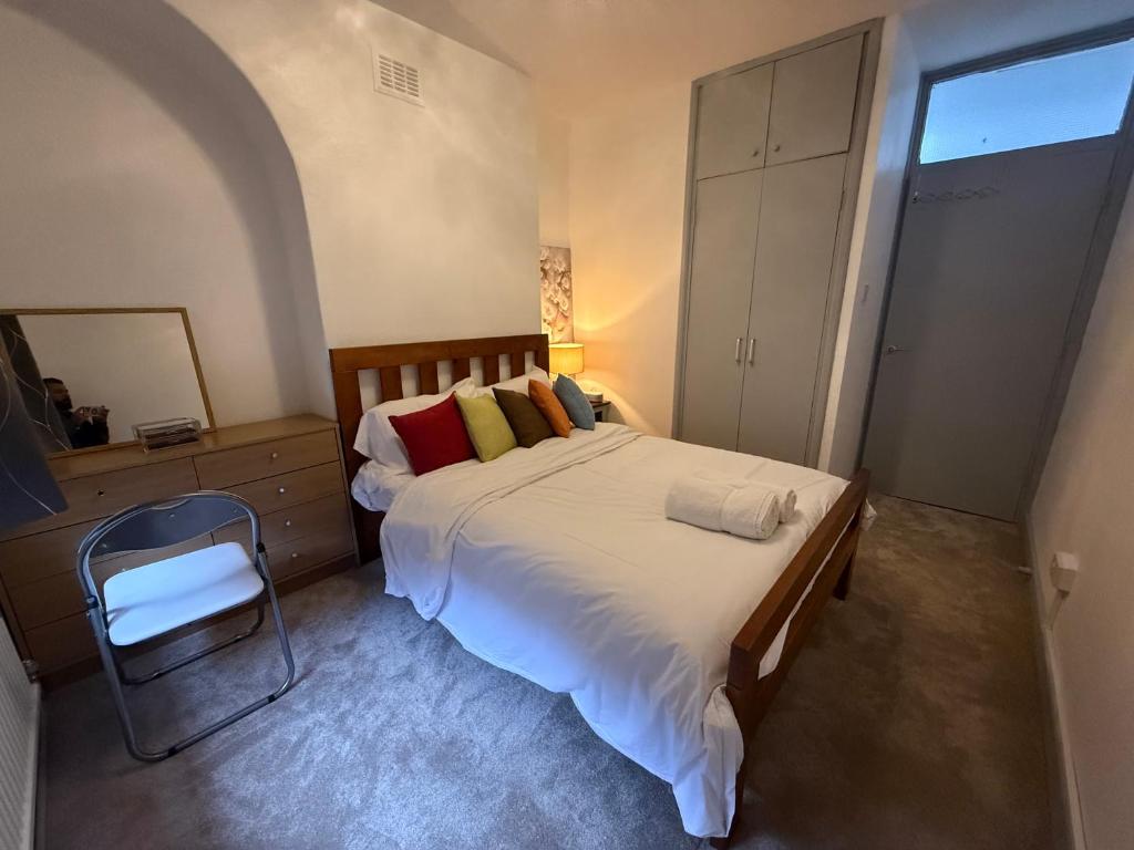 Ένα ή περισσότερα κρεβάτια σε δωμάτιο στο Tonbridge House