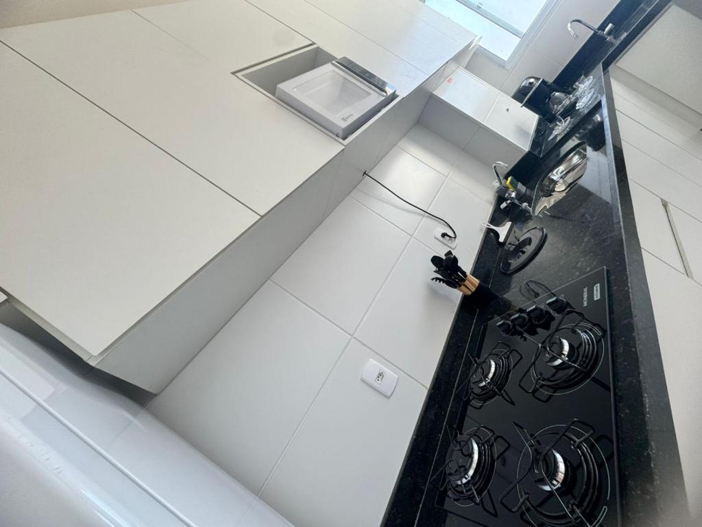 a view from above of a kitchen with a black door at Reserva Almagre Apto 403 in Cabedelo