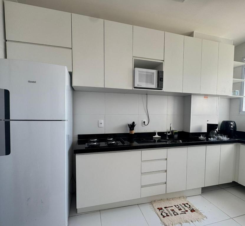 Kuchyň nebo kuchyňský kout v ubytování Reserva Almagre Apto 403